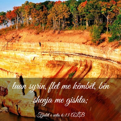 Picture 03 - Fjalët e urta 6:13 ALB - luan syrin, flet me këmbët, bën shenja me - Bible Verse Picture